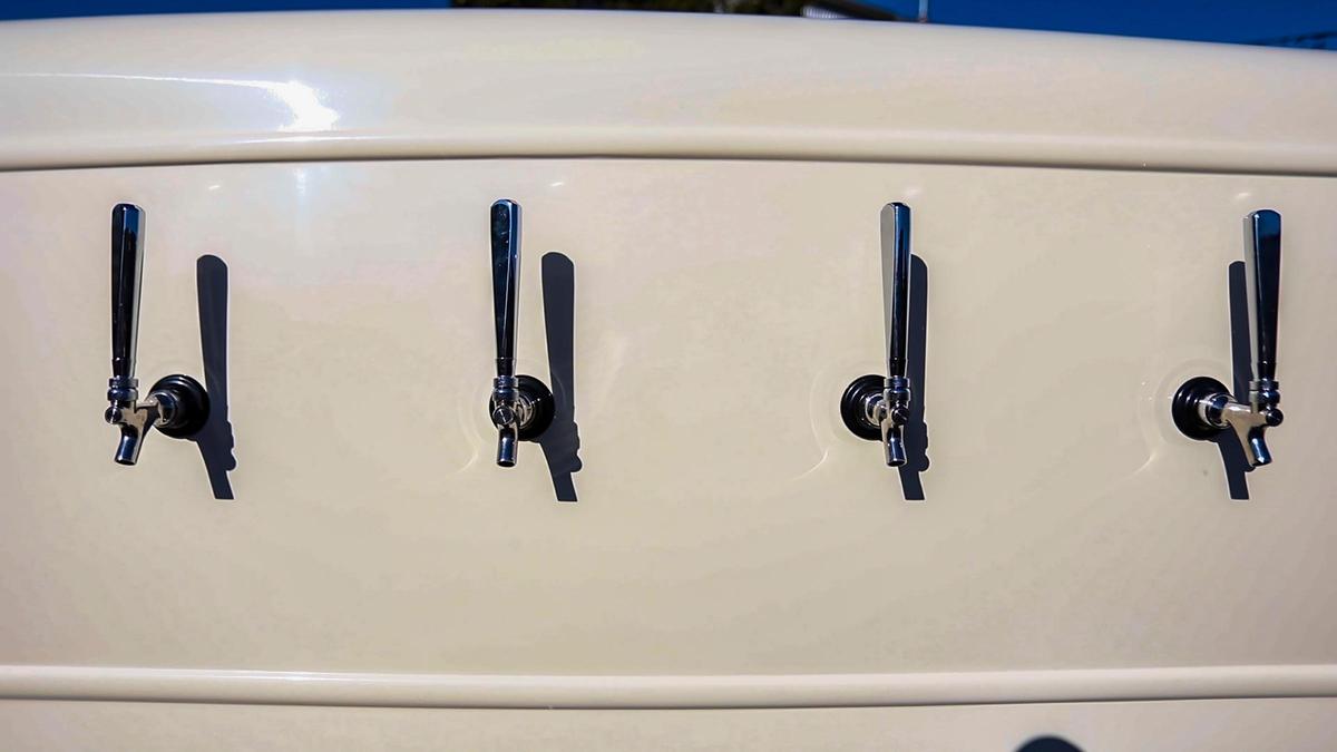 Tap Truck USA’s vintage vehicles are outfitted with four to six beer taps, mounted on the side.