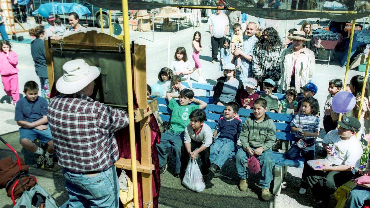 Don Wallis performs with puppets at the Nipomo Swap Meet in March of 2000.