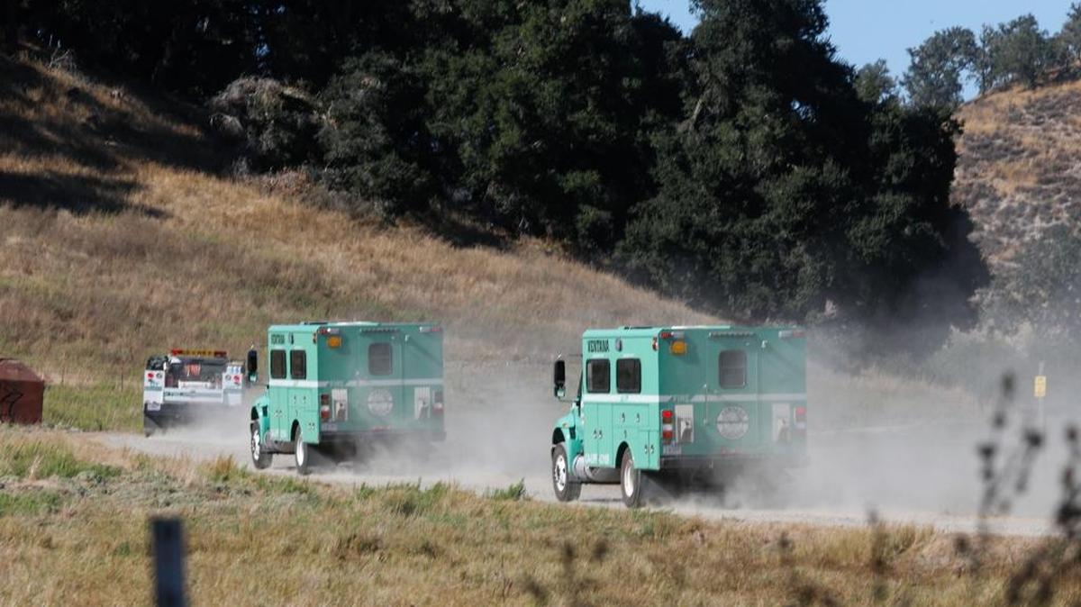 Firefighters work in the steep hills near Huasna east of Arroyo Grande on Wednesday afternoon. Forest Service crews take a ranch road off of Huasna Road to access part of the fire.