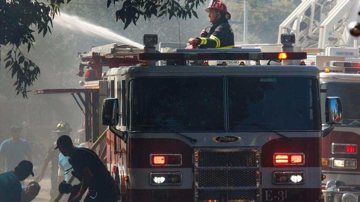 San Luis Obispo firefighters battle a house fire at the corner of Bahia Court and Alrita Street in October 2017.