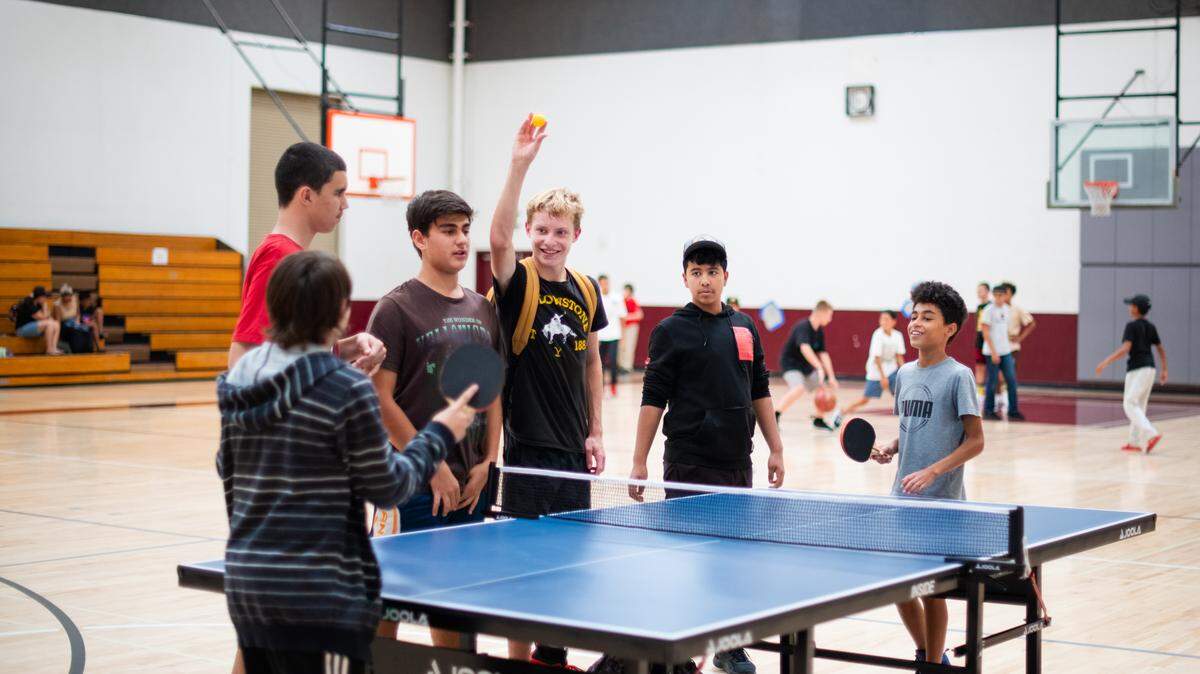 Paso Robles teens play ping pong at the new Paso Robles Teen Center at the Centennial Park gymnasium on August 21, 2023.