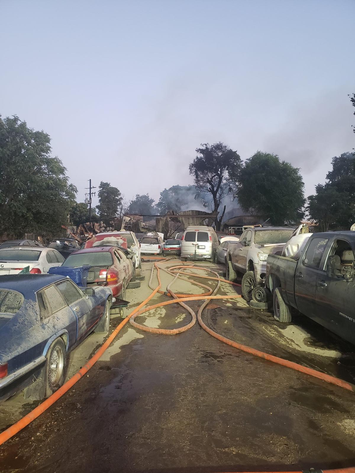 A commercial fire in Paso Robles damaged an auto wreckage lot that was filled with cars and car parts early the morning of June 29, 2024.