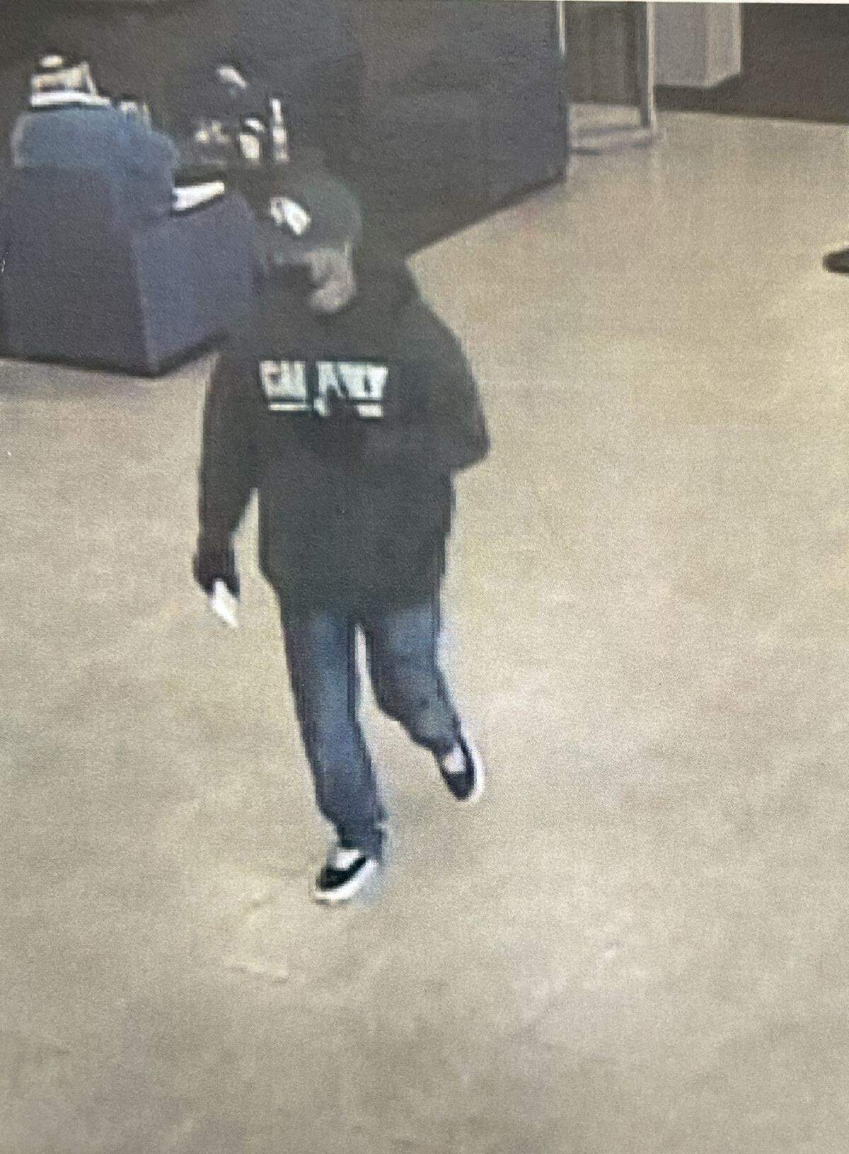 Arroyo Grande police are looking for a man who robbed Chase Bank on Saturday, Feb. 25, 2023, while wearing a green Cal Poly hat, a Cal Poly hooded sweatshirt and a black medical mask.