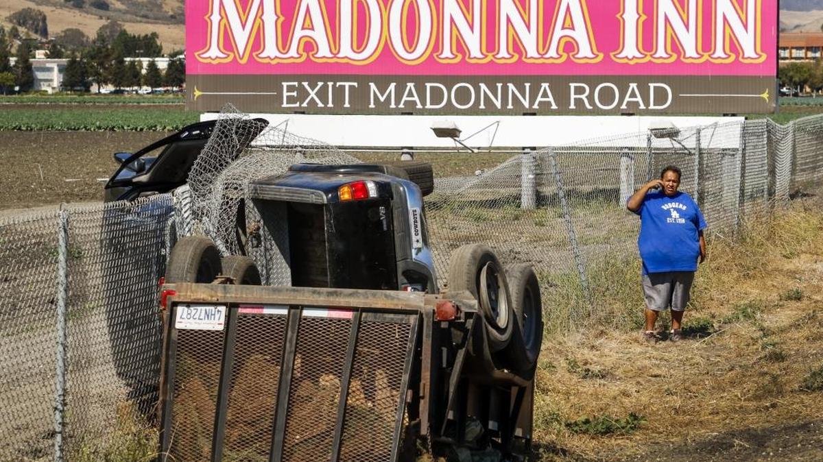 A truck towing a trailer of sod overturned Wednesday on southbound Highway 101 and crashed through a fence just past the Madonna Road on-ramp. No one was hurt in the crash.