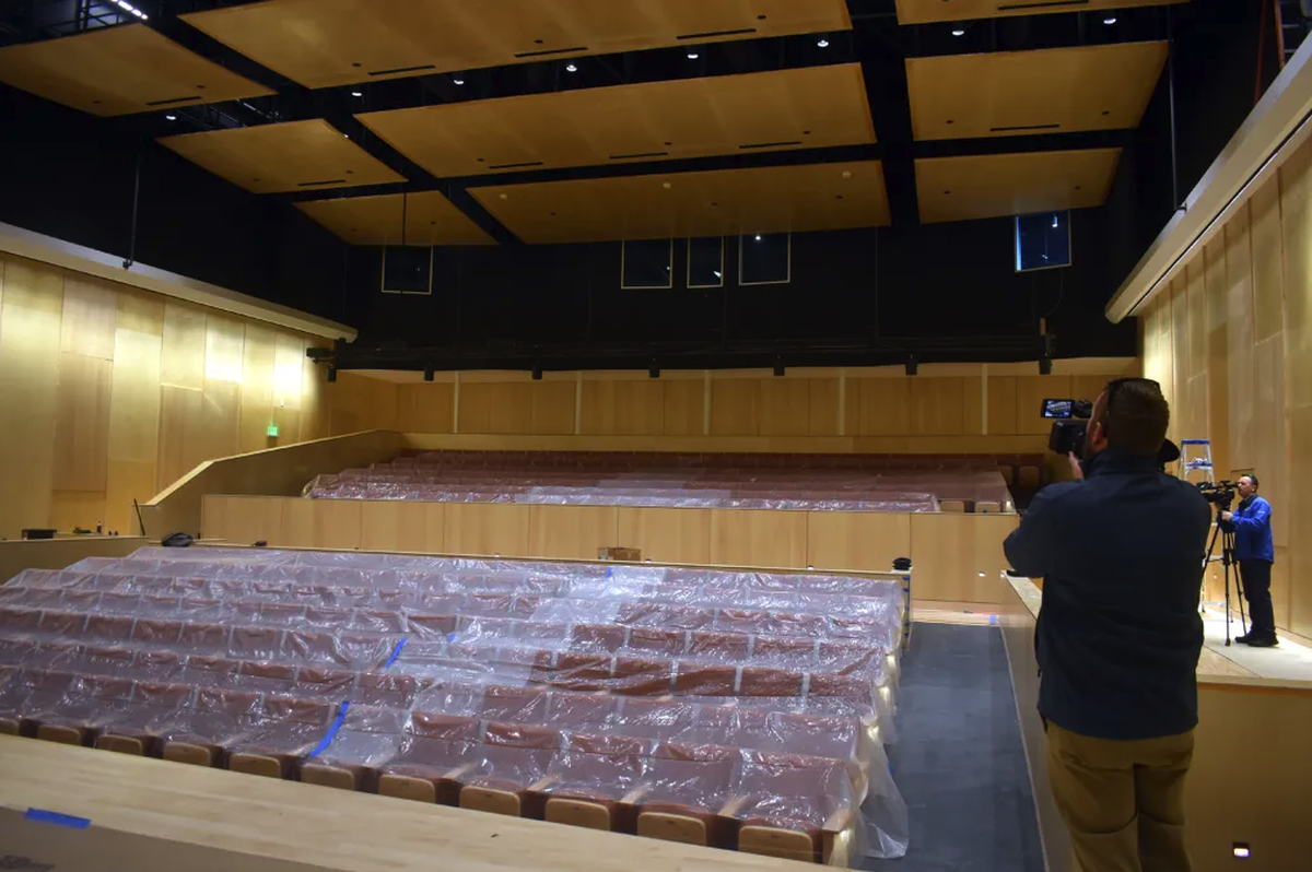 Members of the media record the 400-seat recital hall in the Allan Hancock College Fine Arts Complex.