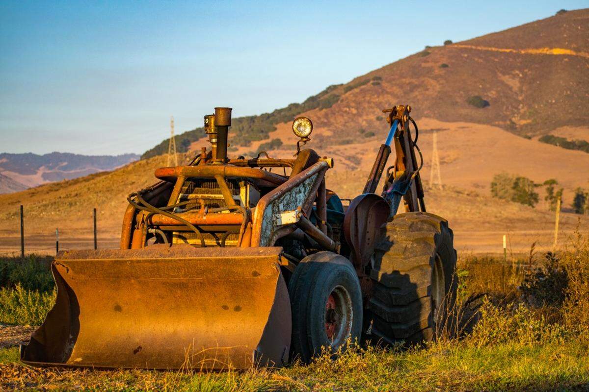 A tractor on the Sunny Acres site on Los Osos Road in San Luis Obispo. The county filed a lawsuit against Dan DeVaul and the nonprofit Sunny Acres organization.