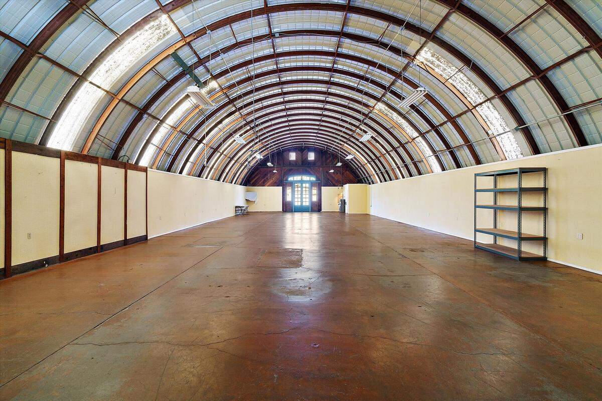 The Solus family will transform this 4,000-square-foot interior of a Quonset hut into a 10-room boutique hotel in Morro Bay.
