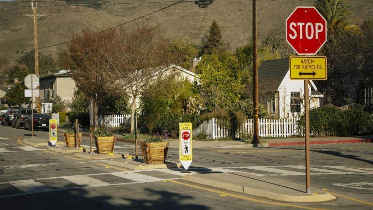 Traffic diverters at Morro and Buchon streets in San Luis Obispo stop vehicles from traveling through the intersection while allowing cyclists to pass through.
