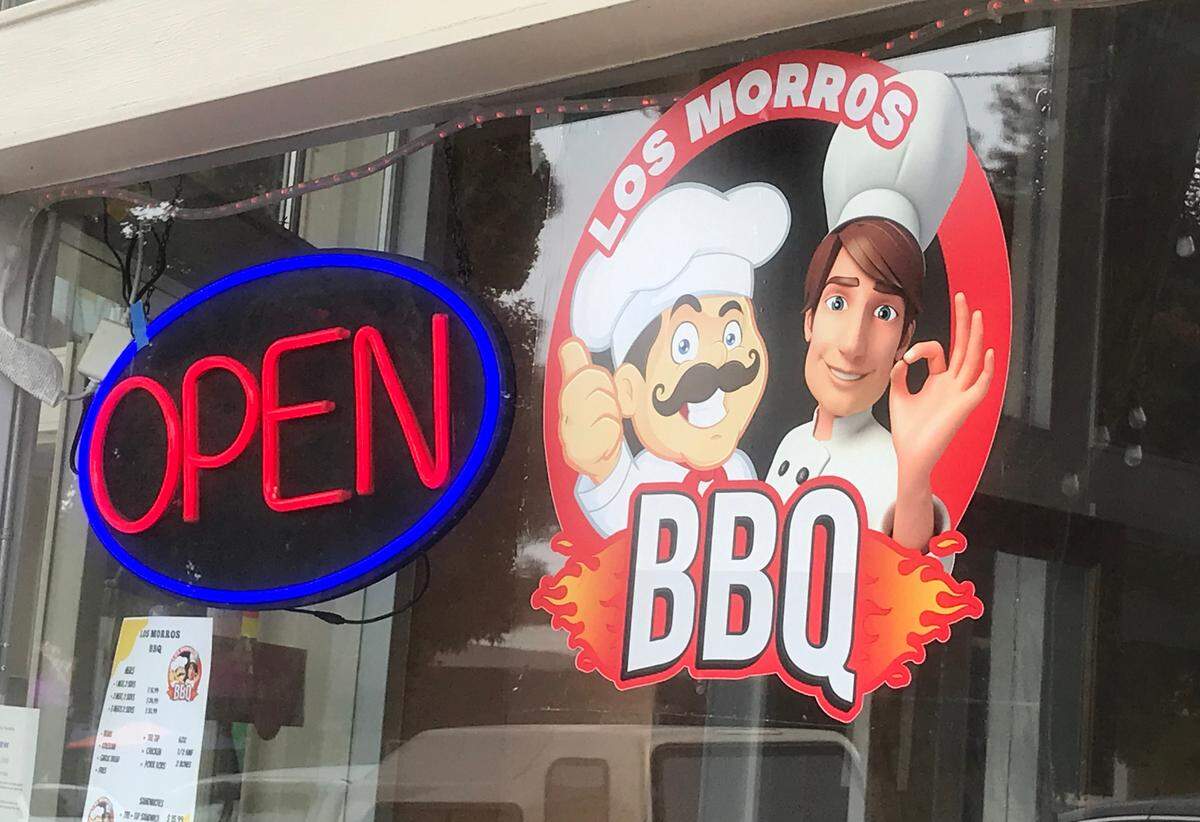 Hungry Morro Bay residents and ‘cue fans waited a long time for this “open” sign to appear at Los Morros BBQ, replacing a “coming soon” that had been in the window for about a year.