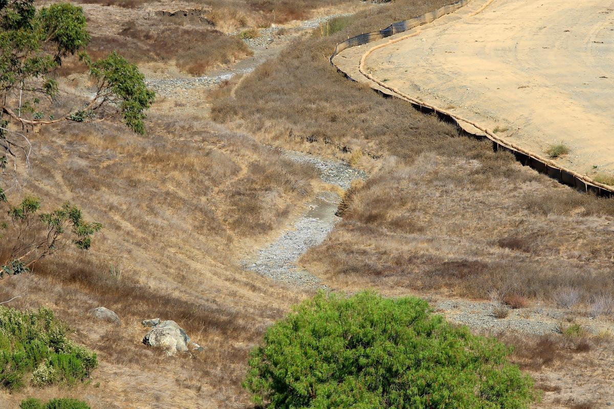 A creek that may be restored to its original state is seen along the bottom of the hillside. The Villaggio project is in the environmental review stage. The residences would include independent and assisted living units, as well as health care facilities with 51 beds for memory care and skilled nursing.