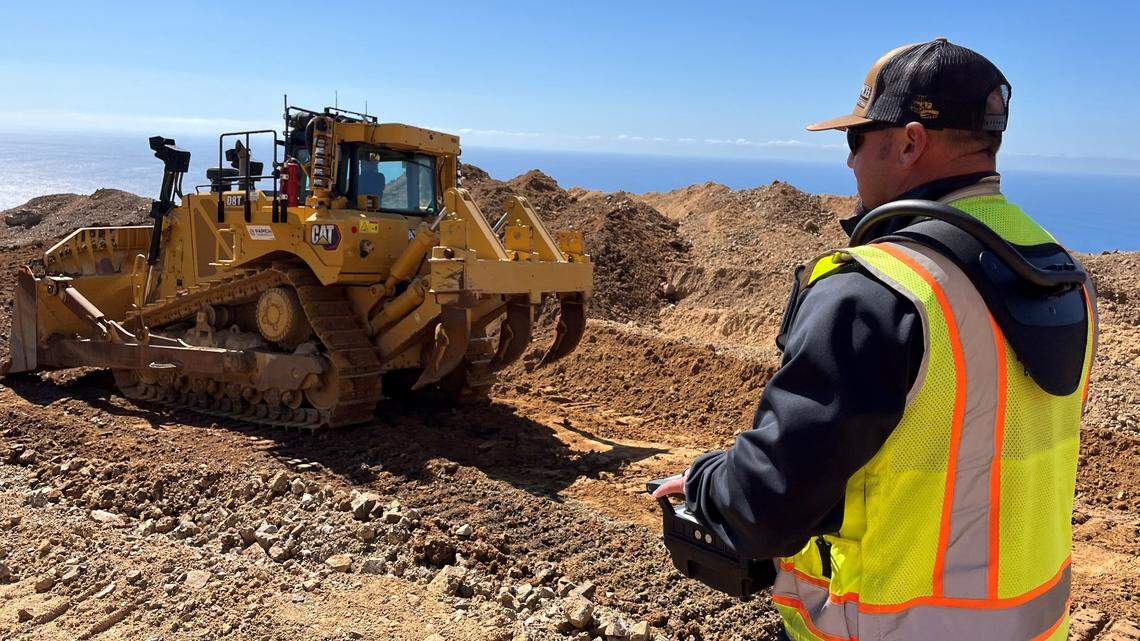 Giant, remote-controlled excavators helping to clear Big Sur slide on Hwy. 1
