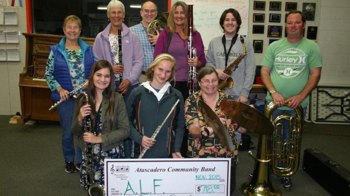 The Atascadero Community Band recently donated $718 to Atascadero Loaves & Fishes, thanks to audience donations from its fall concert. Pictured are band members, back row, from left, Pat Burbank, Vickie Carlson, Myron Deale, Glenda Goulet, Tom Sciortino and Chad Gentry; front row, Maddie Baxstresser, Basia Mierzwinski and Linda Preston.