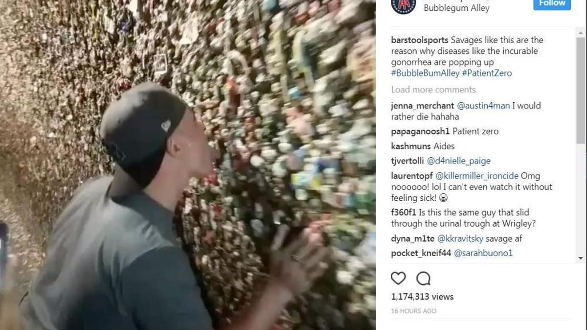 A screenshot of a video in which an unnamed man moves along Bubblegum Alley, licking it and rubbing his hands on it the whole time.