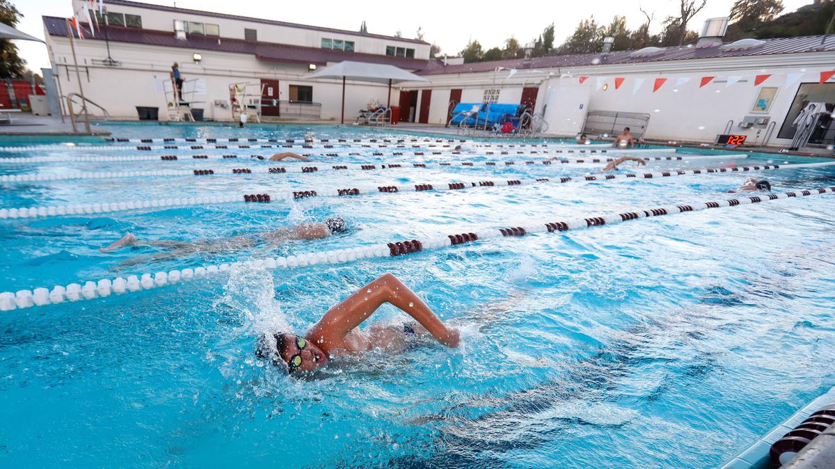 Trevor Jaureguy swims laps during Paso Robles High School swim team practice at the city’s Municipal Pool. The school district is in the midst of trying to find a way to pay for a new pool complex after construction bids came back well over budget.