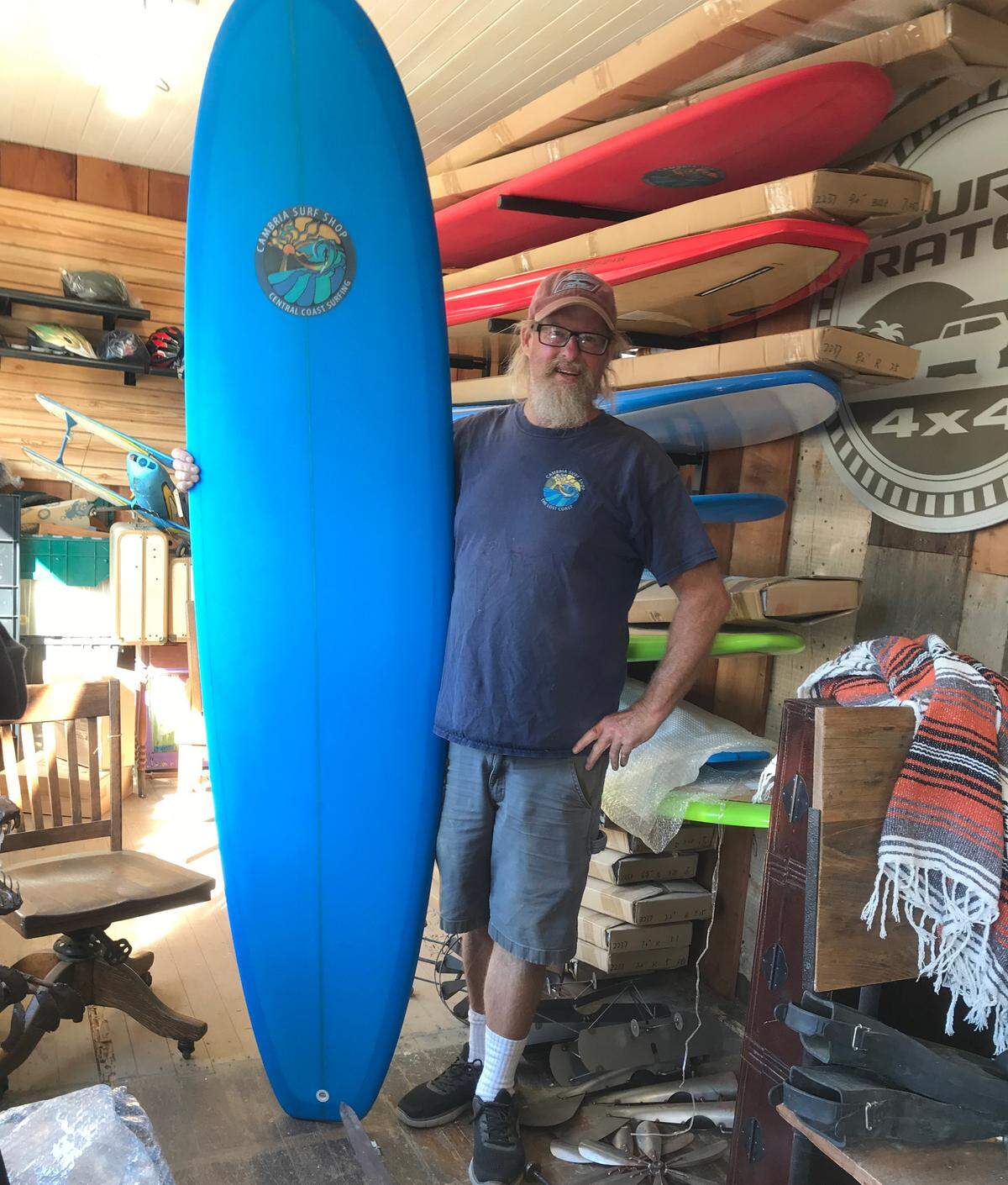 Even though the new focus for Cambria Garden Art is landscaping decor, owner Bill Bookout also stocks surfing goods.