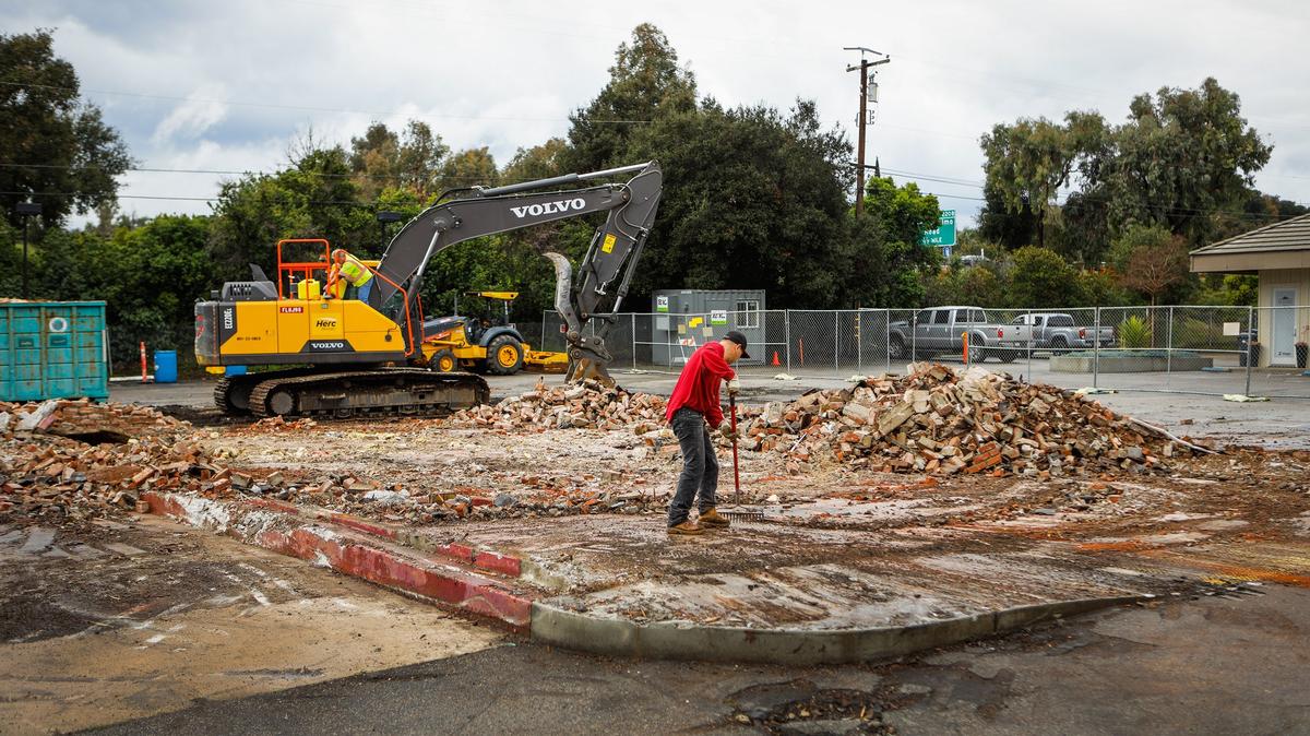 Demolition for the mixed-use La Plaza development began on El Camino Real on Wednesday, January 9, 2019. Crews demolished a long-vacant Jack in the Box, seen here, and an old beauty supply store just across the street from Sunken Gardens.