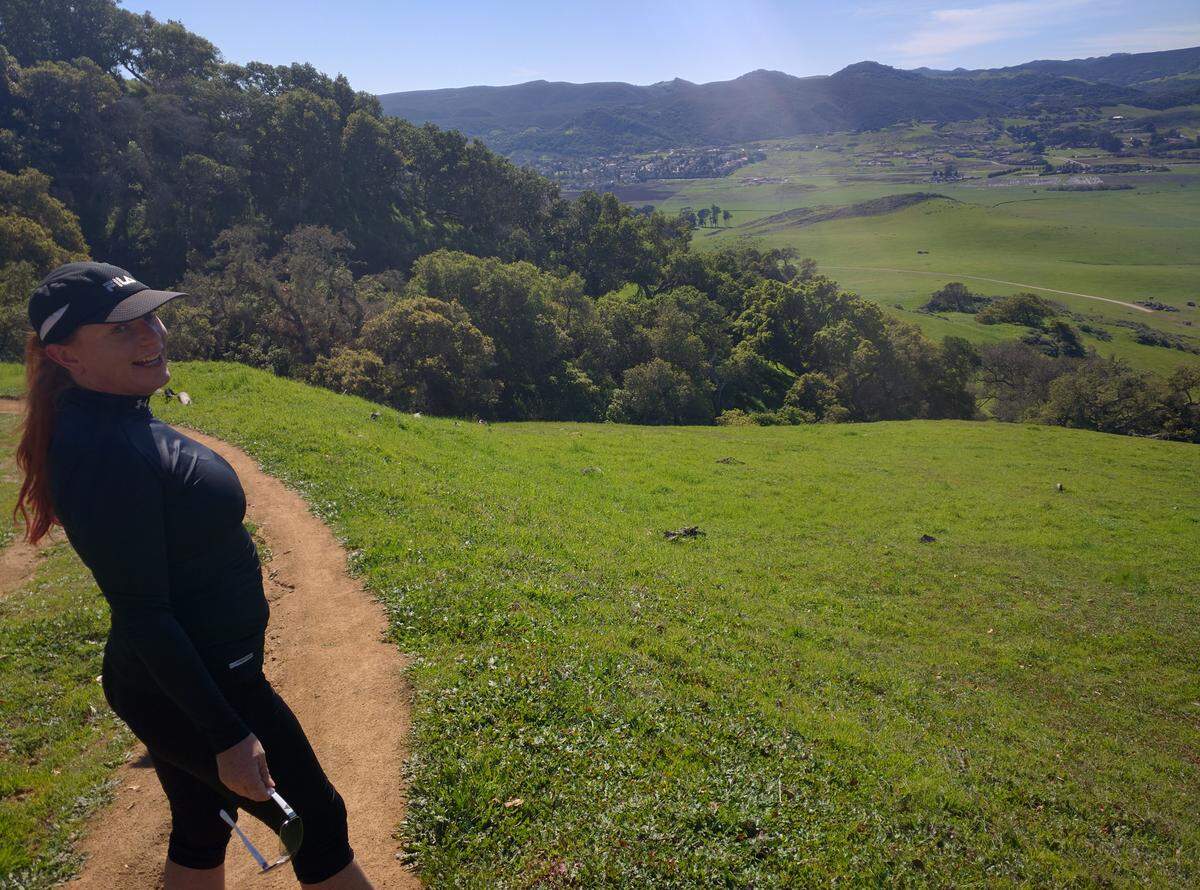 Christine Whaley hikes around the backside of Cerro San Luis with her husband, Tom, and his two daughters in February 2016, nearly four years into her battle with melanoma.
