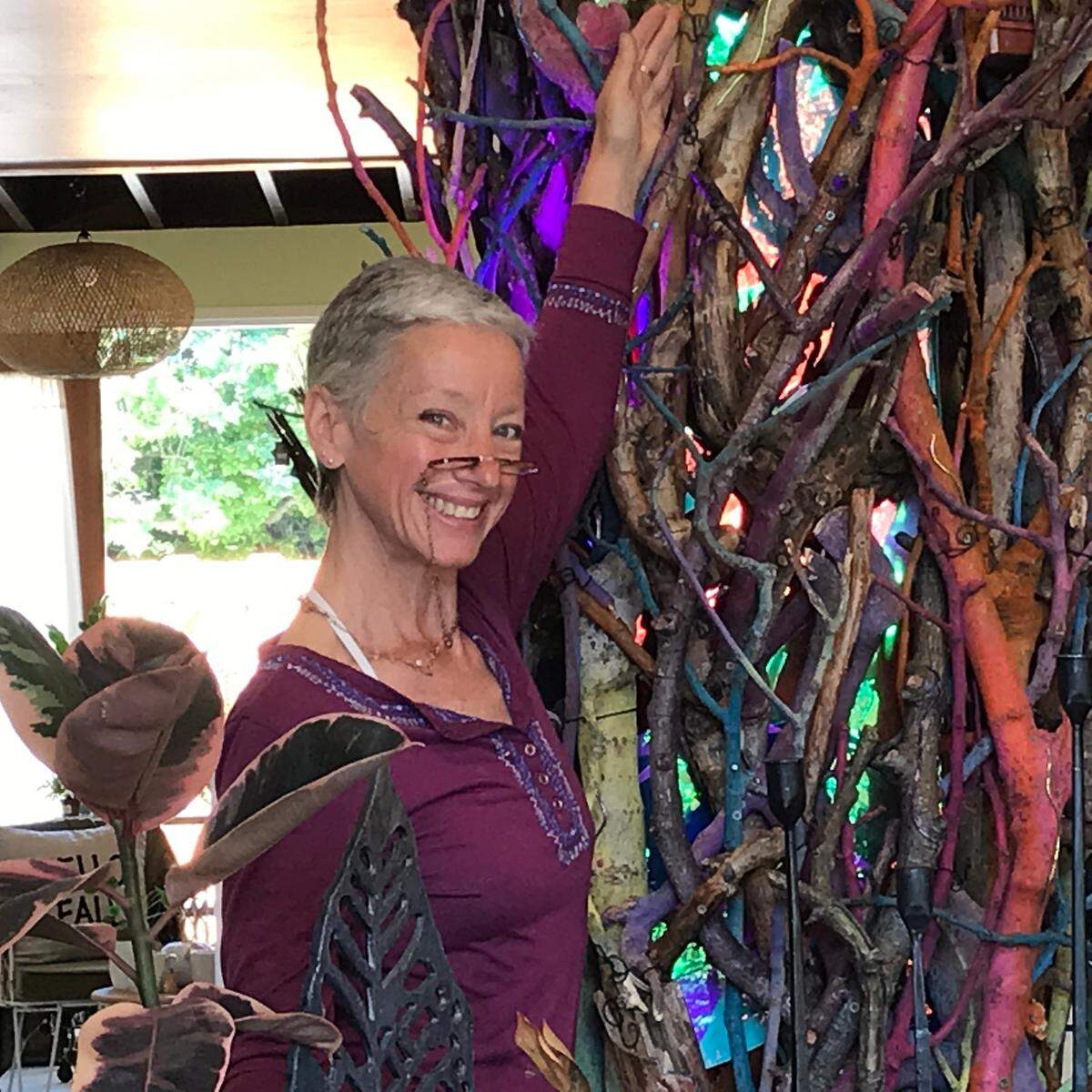 Sally Davis, an artisan and Cambria native, completes her sprawling “Native Tree” creation on Sept. 1, 2022, at the new Cambria Nursery Downtown store at 4039 Burton Drive.