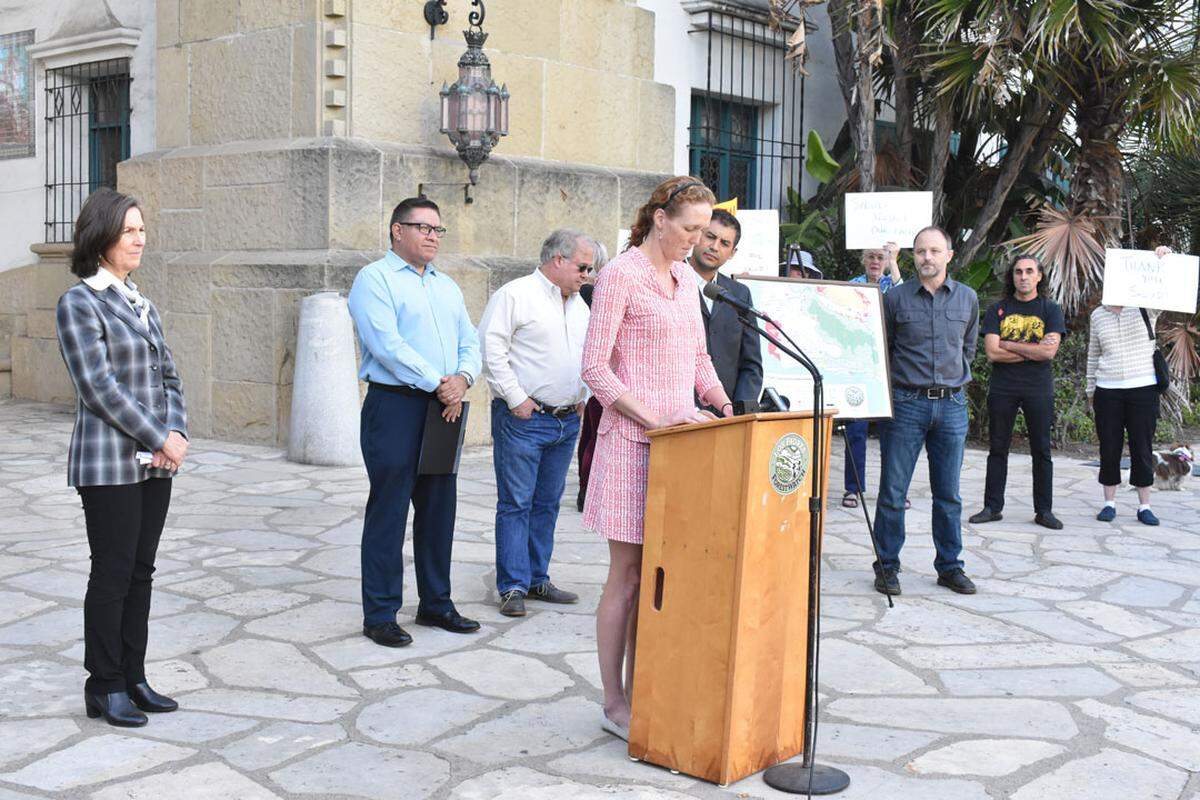 Hallie Greene, Cate School’s director of strategic initiatives, speaks at the Santa Barbara County Courthouse Sunken Garden in downtown Santa Barbara on Thursday during a rally against a federal drilling and fracking proposal.