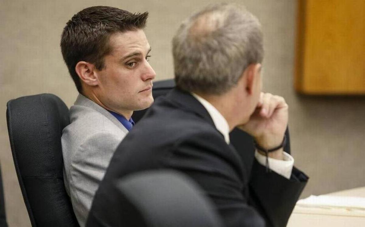 Former Grover Beach police officer Alex Geiger, left, appeared with his attorney John Jackson in July at the beginning of his preliminary hearing on felony charges of involuntary manslaughter and failing to maintain control of a dangerous animal. A judge ruled that Geiger will face trial on all three counts in the deadly December 2016 dog attack.