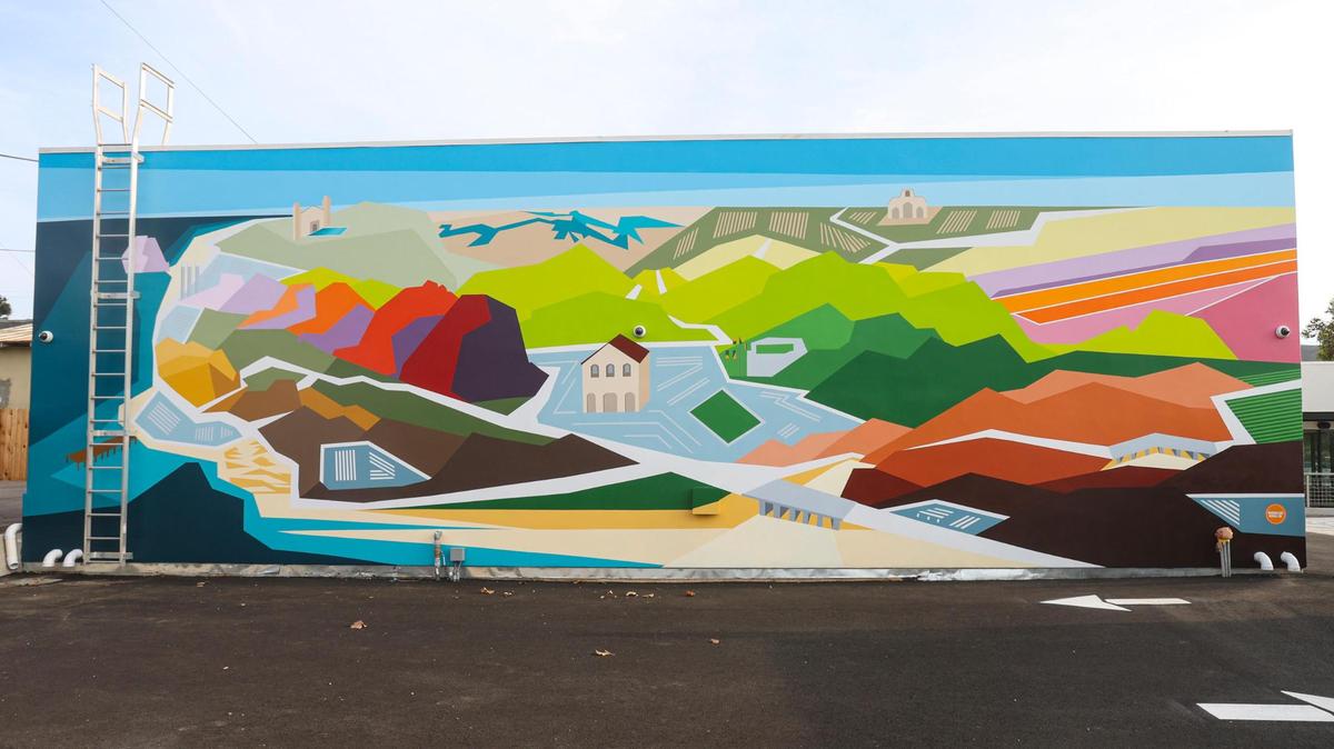 A new mural on the side of the Natural Healing Center building on Broad Street showcases familiar landmarks throughout SLO County, including the Mission, wineries and the coastline.