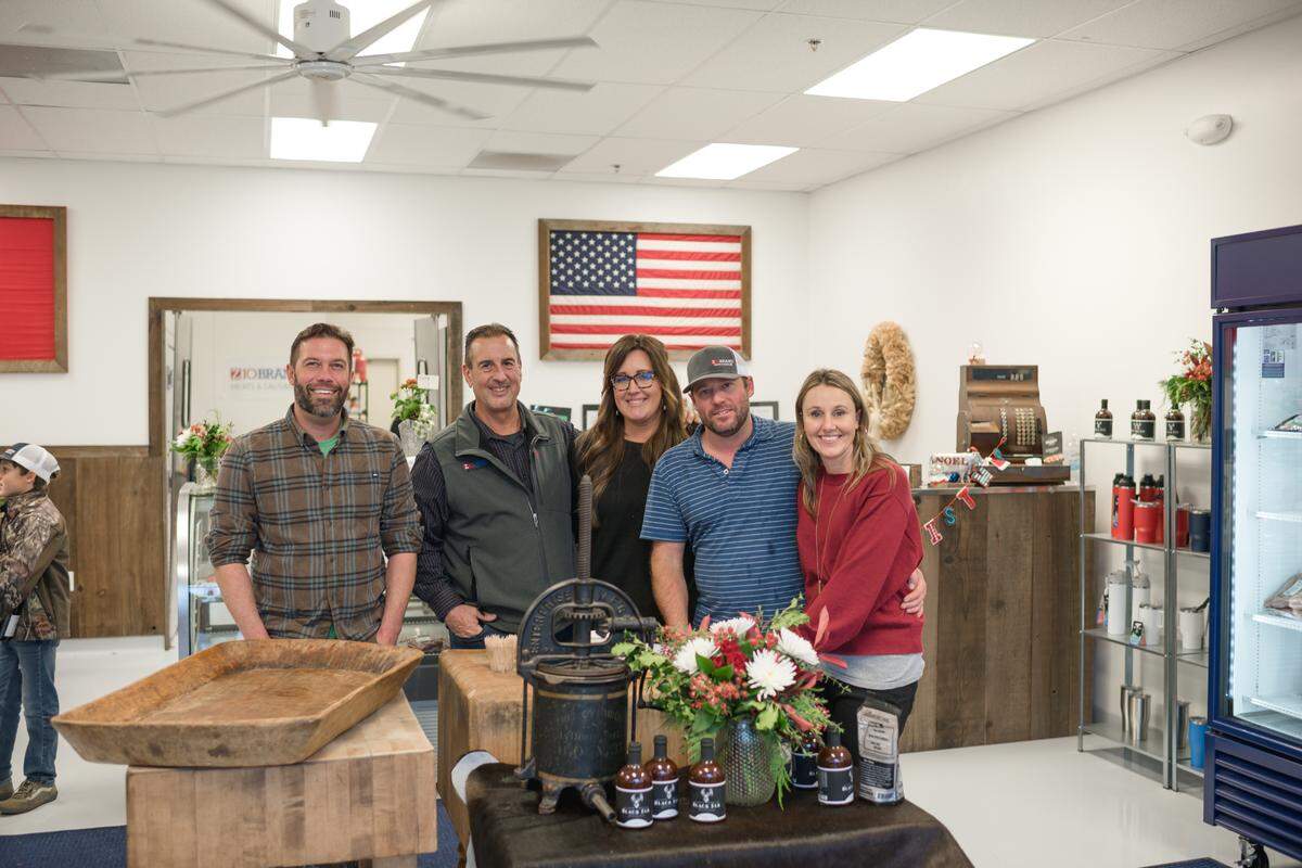 The Zio Brand Meats and Sausage team includes, from left, Anthony Pessagno, John Sartori, Michelle Bush, and Ellie and Lindsay Almond.