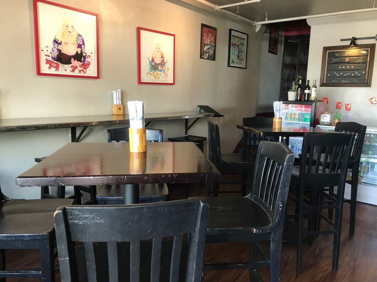 This corner of the downstairs dining room at the tiny, historic Mee Heng Low Chinese restaurant includes the start of a staircase that leads to the upper level dining room. That area used to be an apartment occupied by members of the longtime owners, the Gin family.