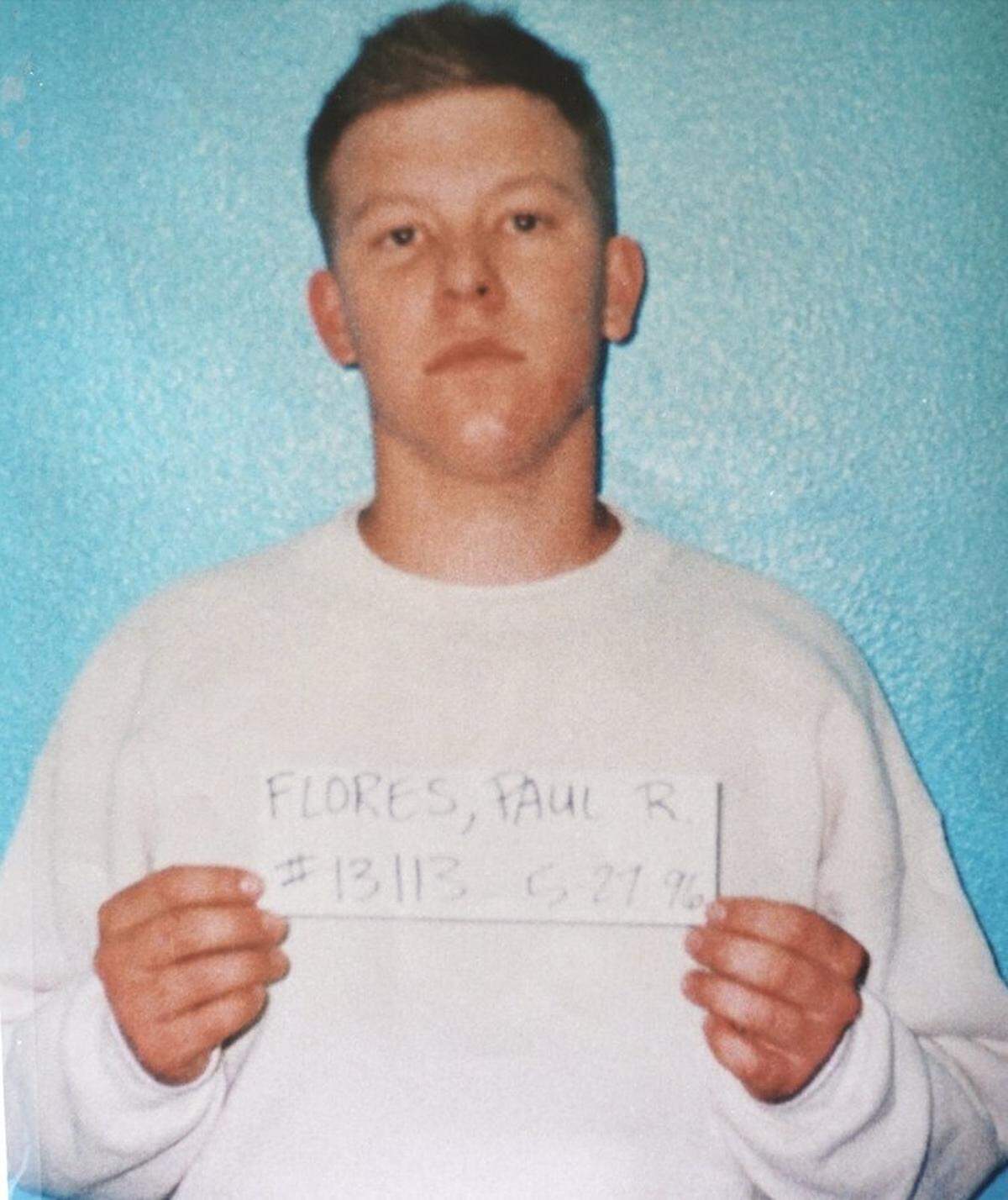 A May 27, 1996, mug shot shows Paul Flores with a black eye. Flores turned himself into Arroyo Grande Police for an outstanding warrant in a DUI case two days after Cal Poly student Kristin Smart disappeared, court documents show.