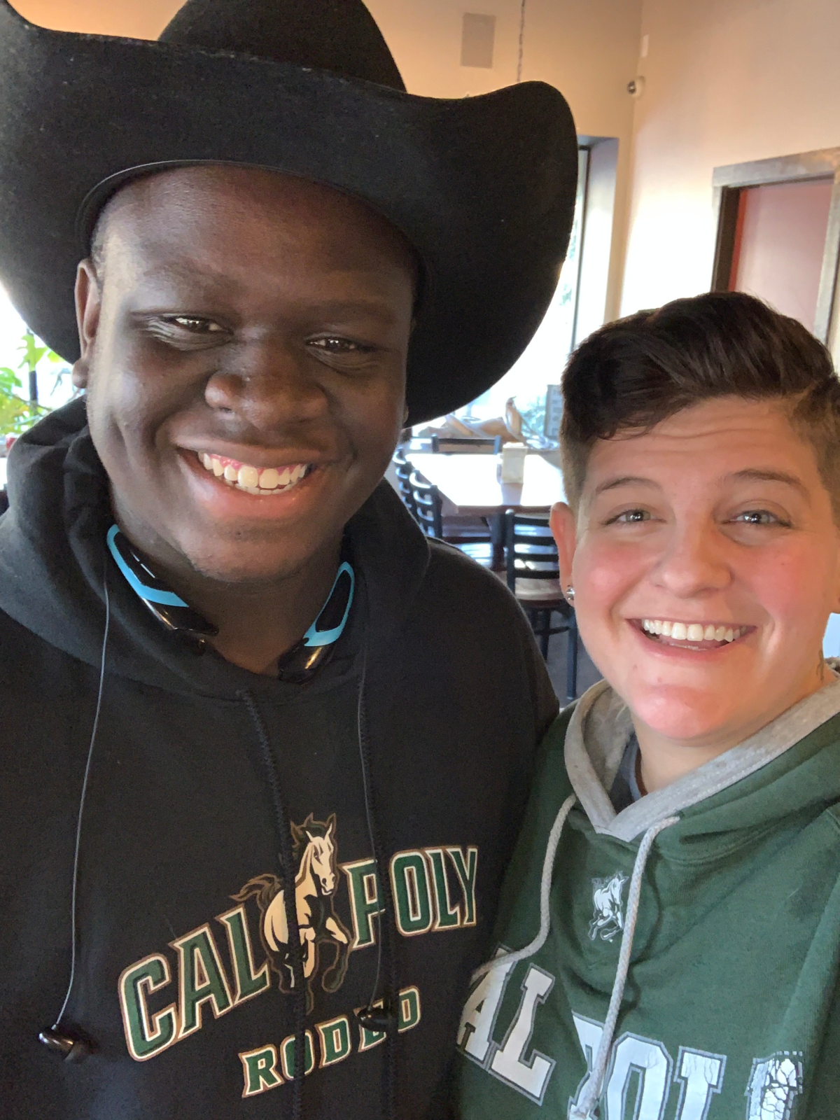 James Ray Jr. and his teacher, Briana Kramer, pose for a photo.