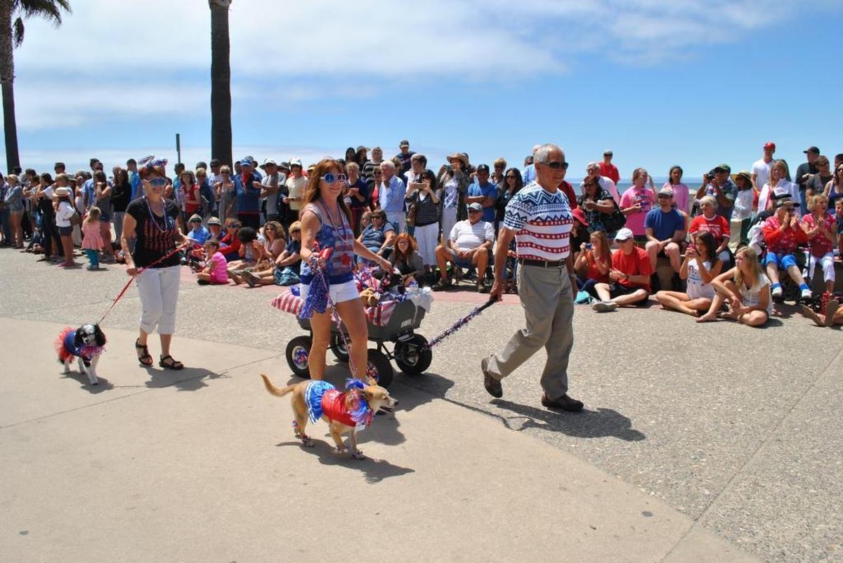 Dogs and their owners will participate in the Avila Beach Doggie Parade on Tuesday.
