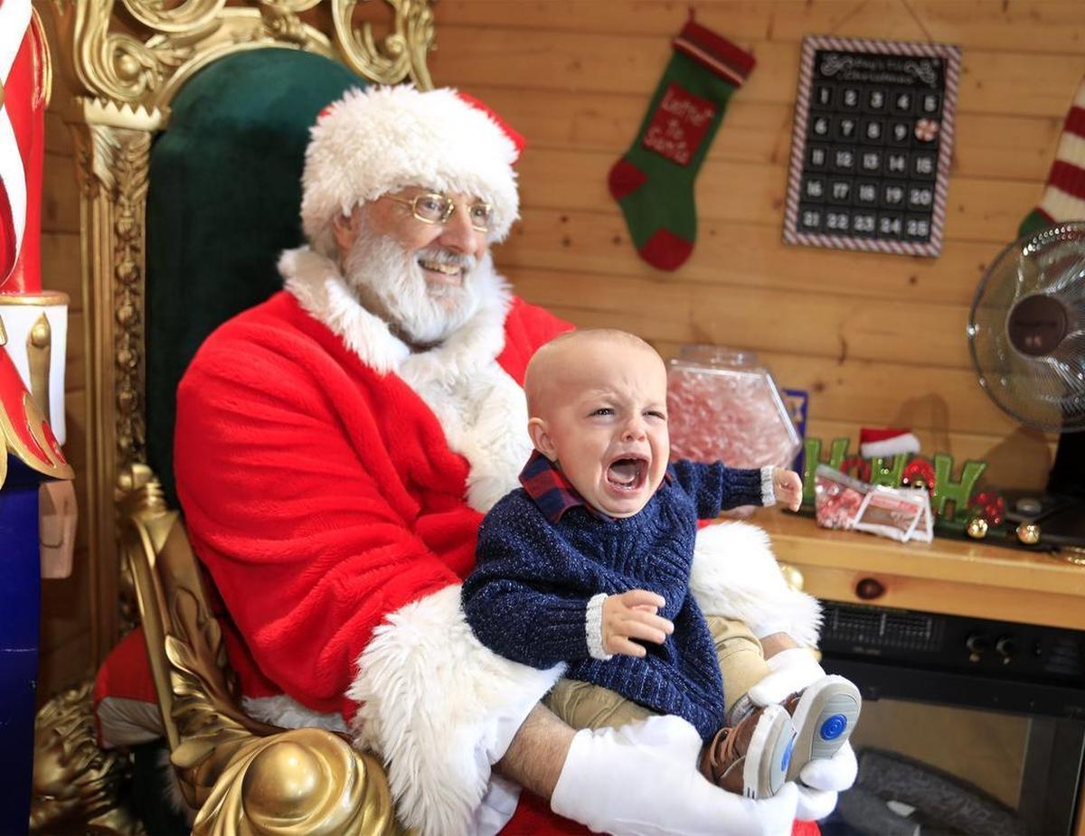 Tribune photographer Laura Dickinson won an award for best feature photo for this image of baby Hayes Rees, of Atascadero, who visited Santa Claus at the Mission Plaza in downtown San Luis Obispo in December 2017.