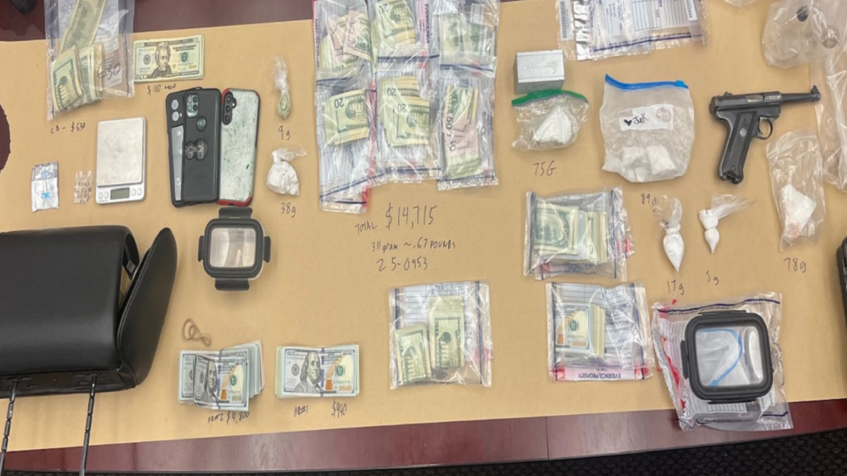 Two people were arrested after police allegedly found drugs, cash and a handgun in a San Miguel storage unit and a Paso Robles car and home.