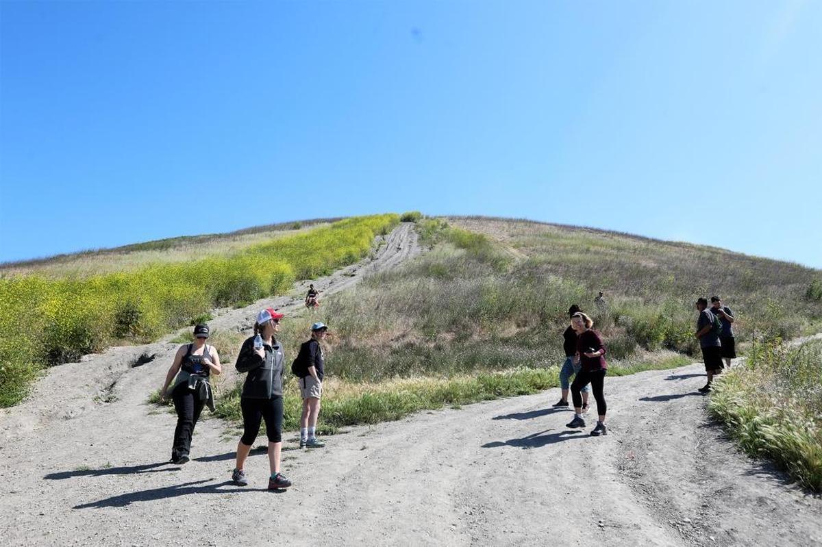 Hikers enjoy the Ontario Ridge Trail on a warm Sunday afternoon, April 23, 2017.