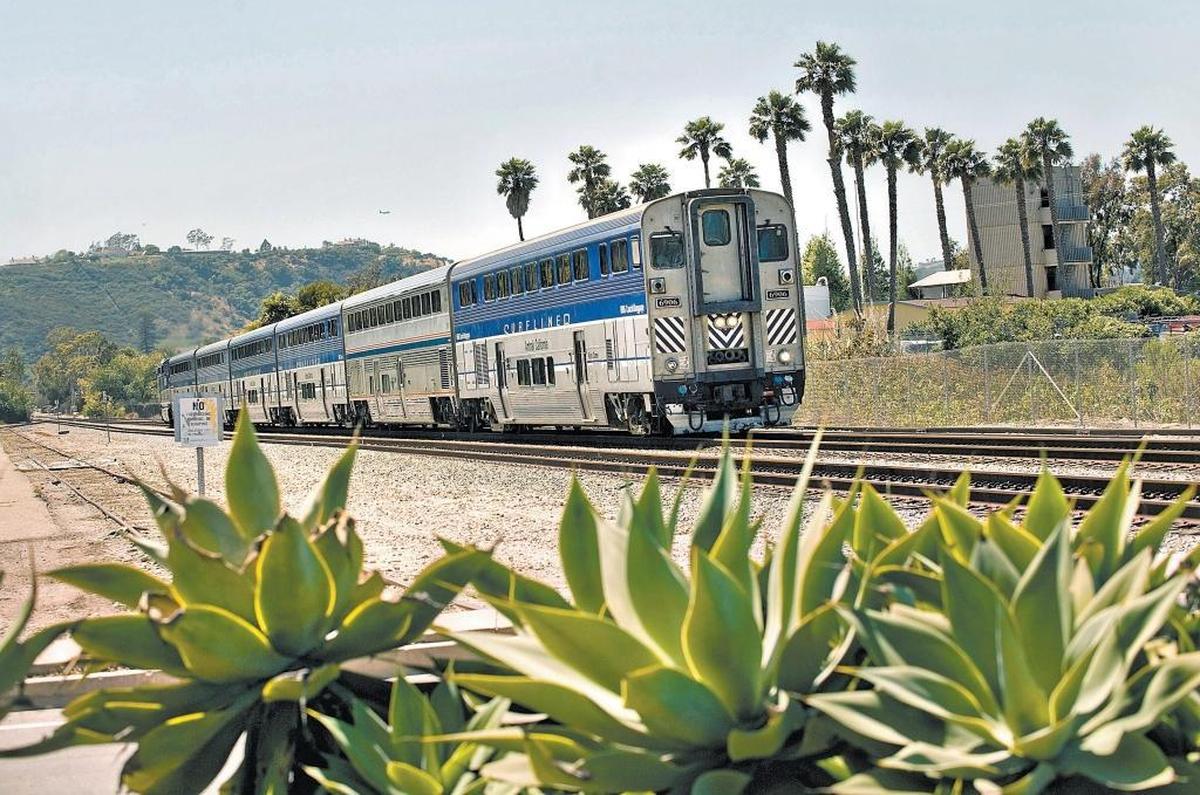 A Pacific Surfliner train travels through Santa Barbara.