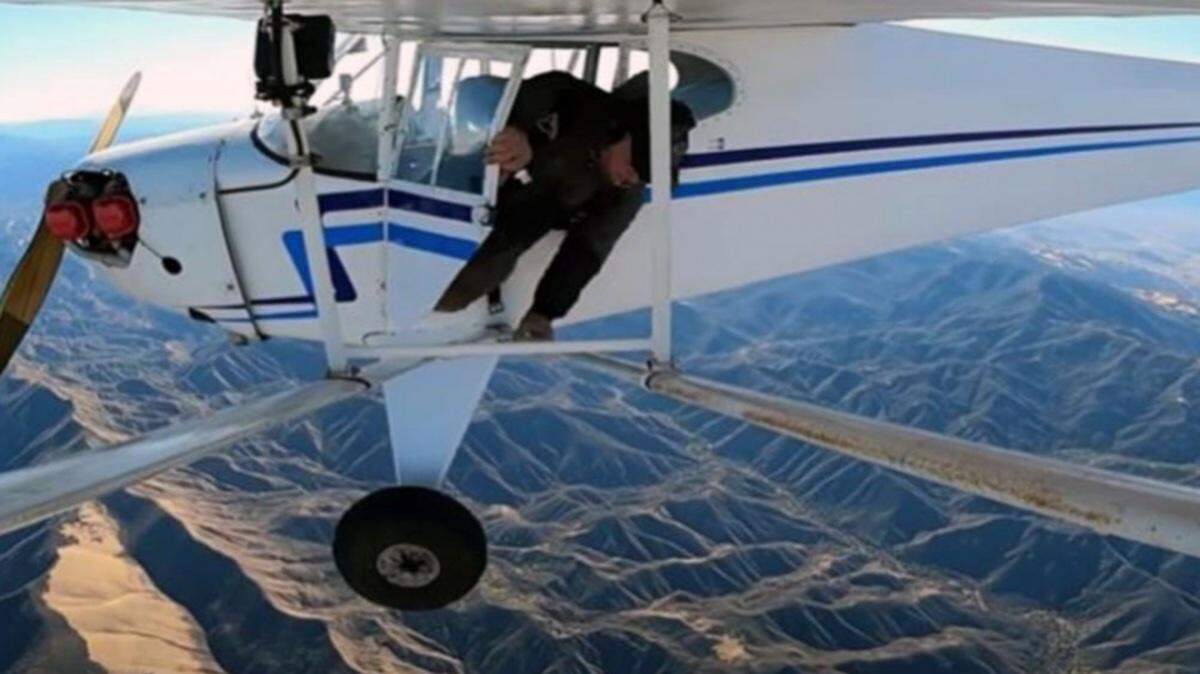 Trevor Jacob bails out of his small plane in November 2021 above the Santa Barbara backcountry. The FAA revoked his pilot’s certificate, alleging he parachuted out of the aircraft “solely so you could record the footage of the crash” for a YouTube video.