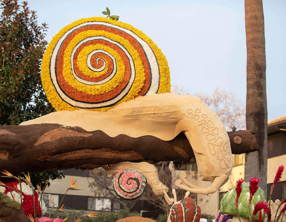 The Cal Poly Universities Rose Float, “Road to Reclamation,” makes its way down Colorado Blvd in Pasadena on Jan. 2, 2023. The float won the Extraordinaire Award. The float featured animated snails, gigantic toadstools and other marvels of the natural world that can be found on the forest floor