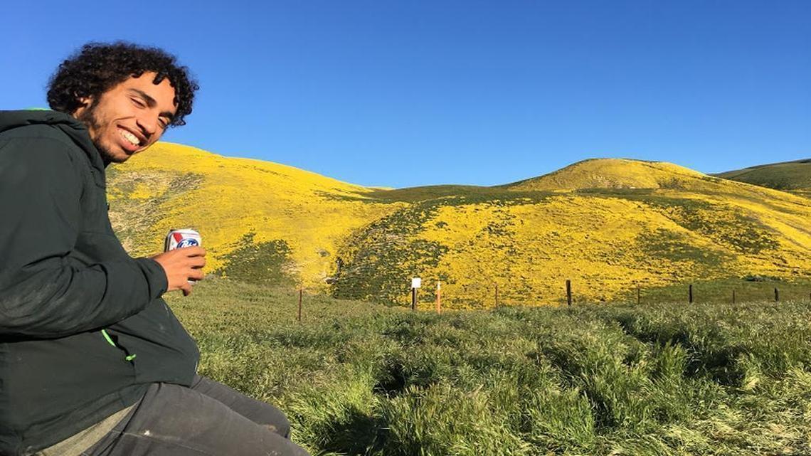 Kennedy Love, 22, who was killed in a hit-and-run on Tuesday night, smiles during a visit to see the superbloom on the Carrizo Plain this past spring.