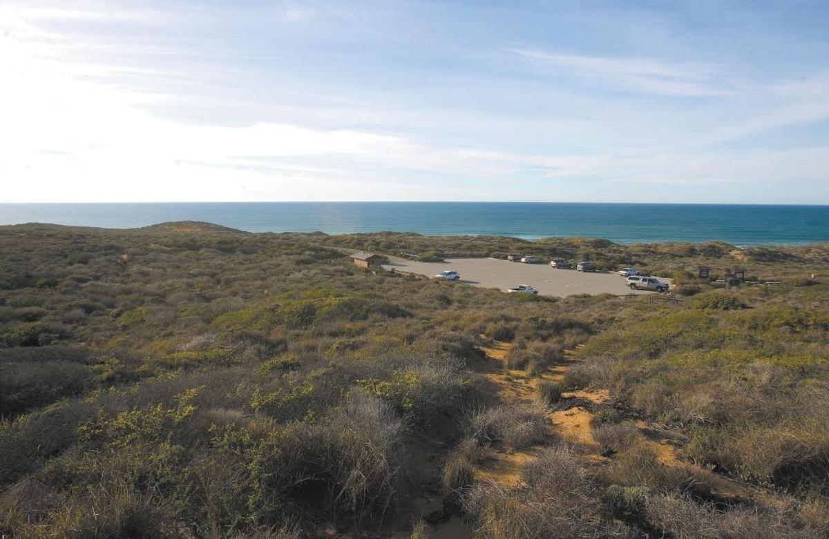 The sand spit Parking in Montana de Oro State Park lot will be affected by removal of a fiber optic cable.
