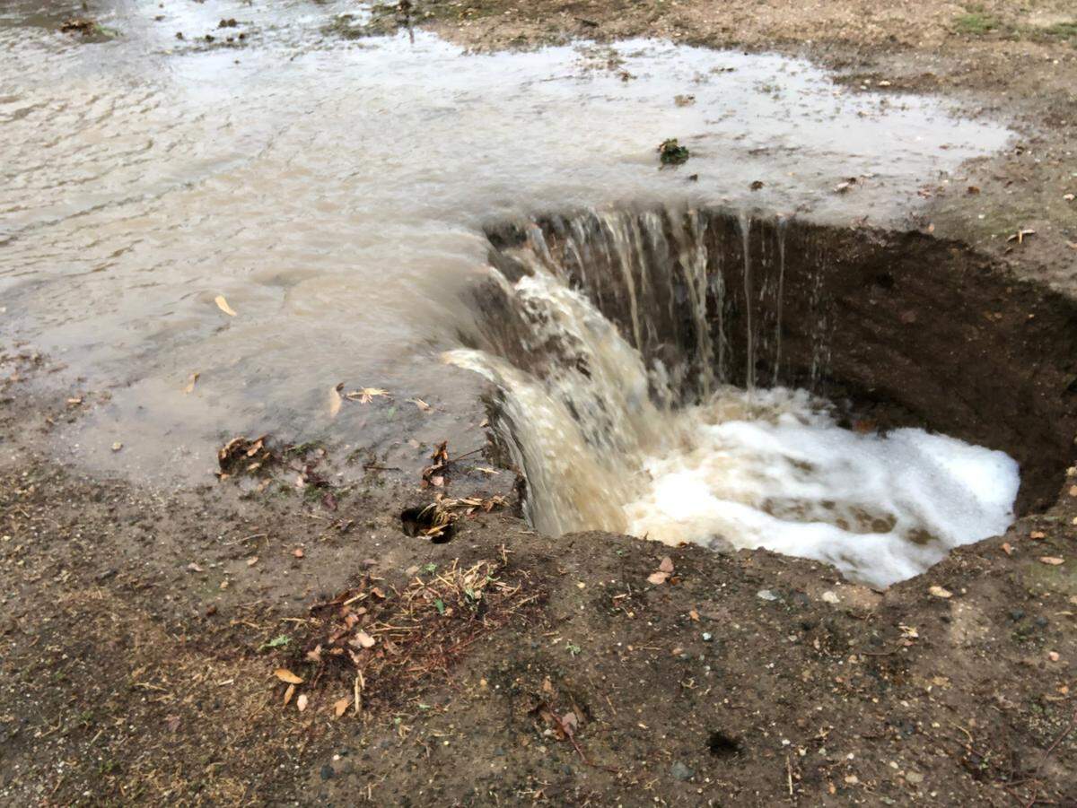 Severe flooding created a sinkhole in a neighborhood on Monterey Road near Wellsona Road between Paso Robles and San Miguel.