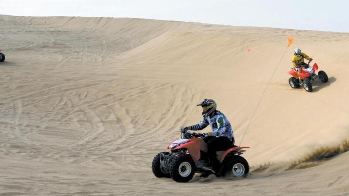 Off-road enthusiasts ride quads at Oceano Dunes SRVA in 2014. Four park visitors have died in ATV accidents this year.