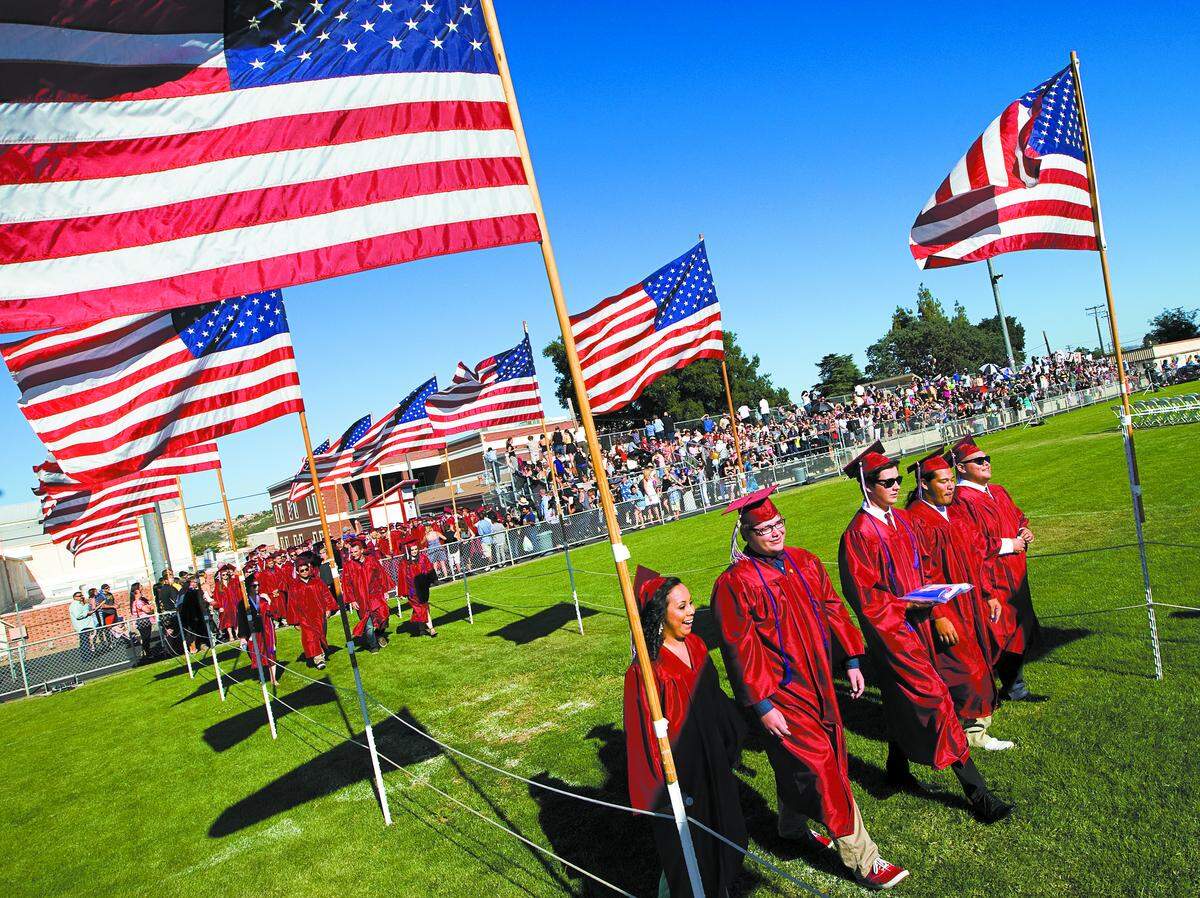 Graduates enter War Memorial Stadium at the start of the Paso Robles High School graduation.
