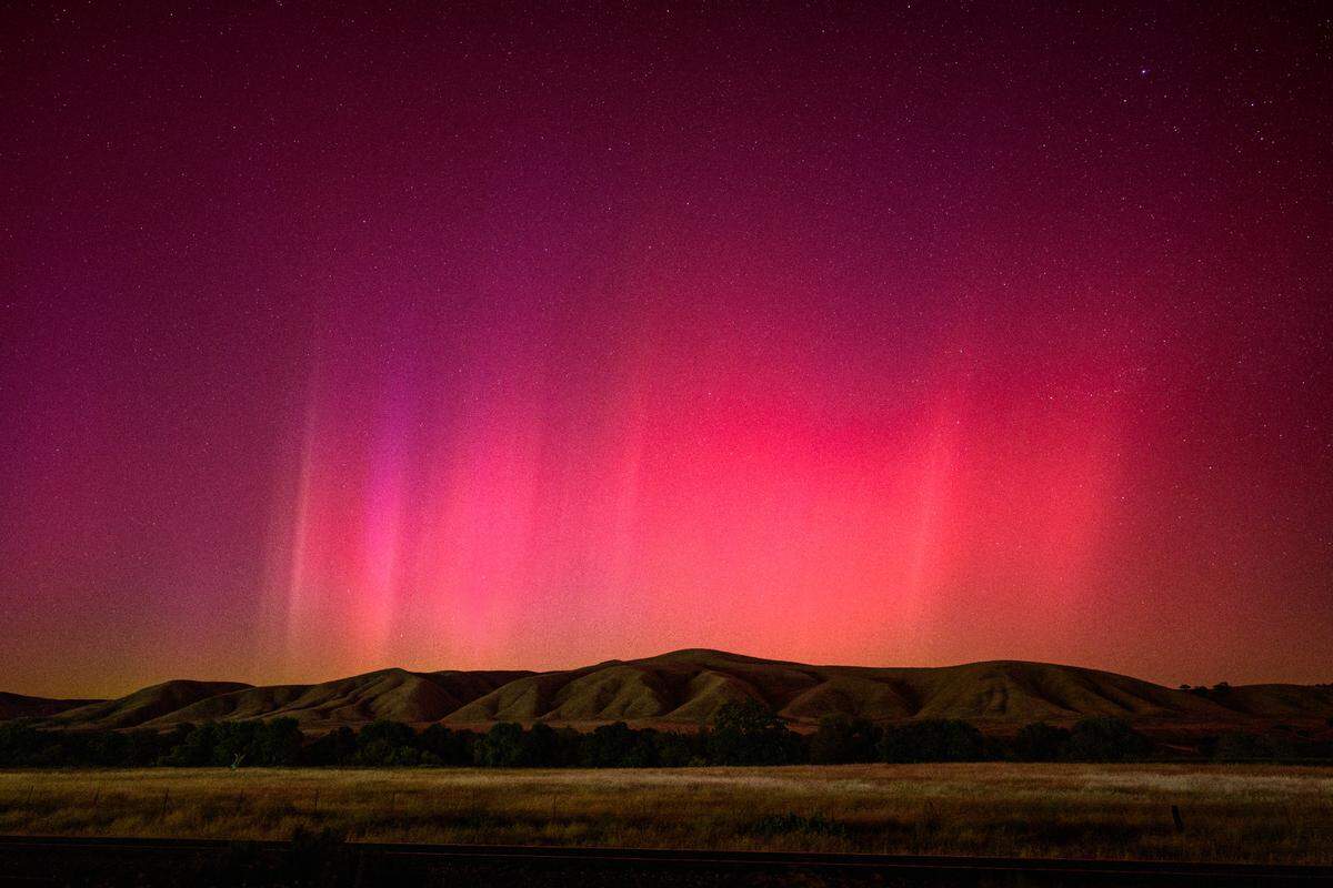 The northern lights illuminate the skies over San Miguel on May 10, 2024.