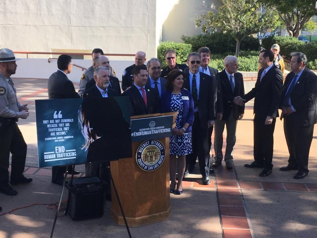Assemblyman Jordan Cunningham, at podium, leads a news conference with San Luis Obispo County officials in January at the County Courthouse to announce four state Assembly bills that aim to fight human trafficking. One of those bills was signed by Gov. Jerry Brown on Monday.