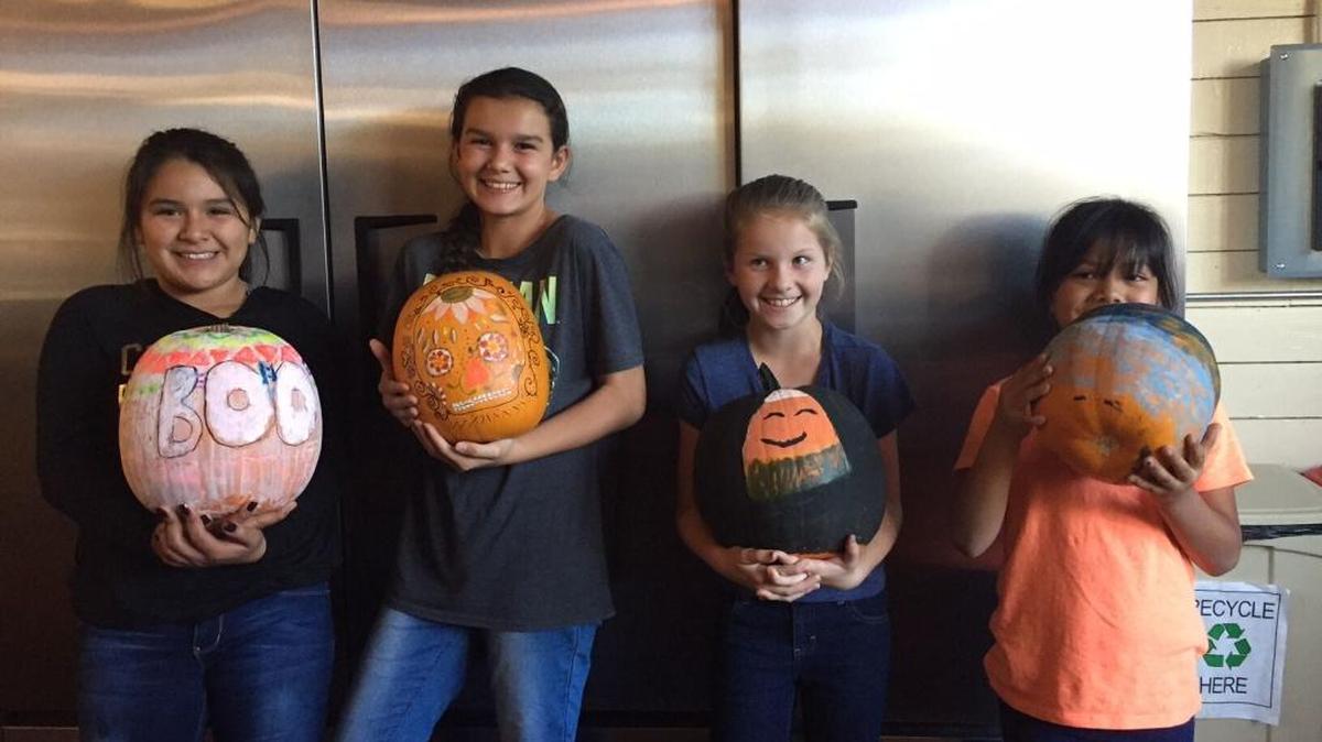 Members of the Boys and Girls Club of North San Luis Obispo County show off their decorated pumpkins in 2016, donated to the club by Ancient Peaks Winery.