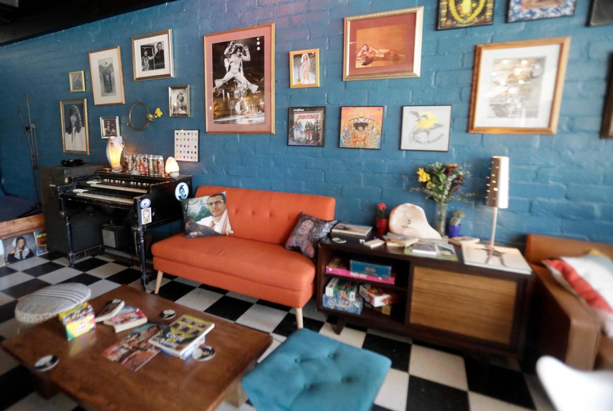 The Raconteur Room, a new wine and beer bar near in downtown Atascadero, opened in May. The main seating area has a cozy, eclectic atmosphere with vintage photos and paintings on the wall.