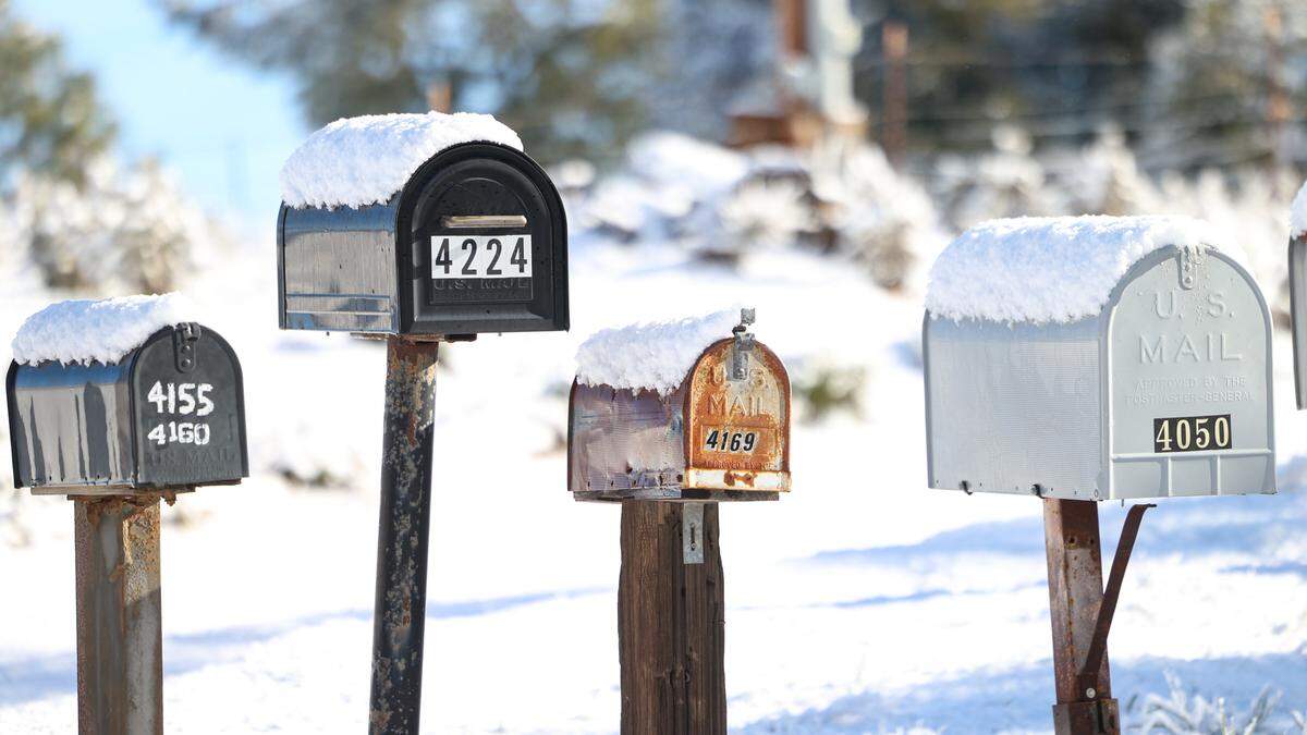 Mailboxes on Parkhill Road near Stagecoach Canyon Road show about an inch of snow accumulation on Feb. 23, 2023.