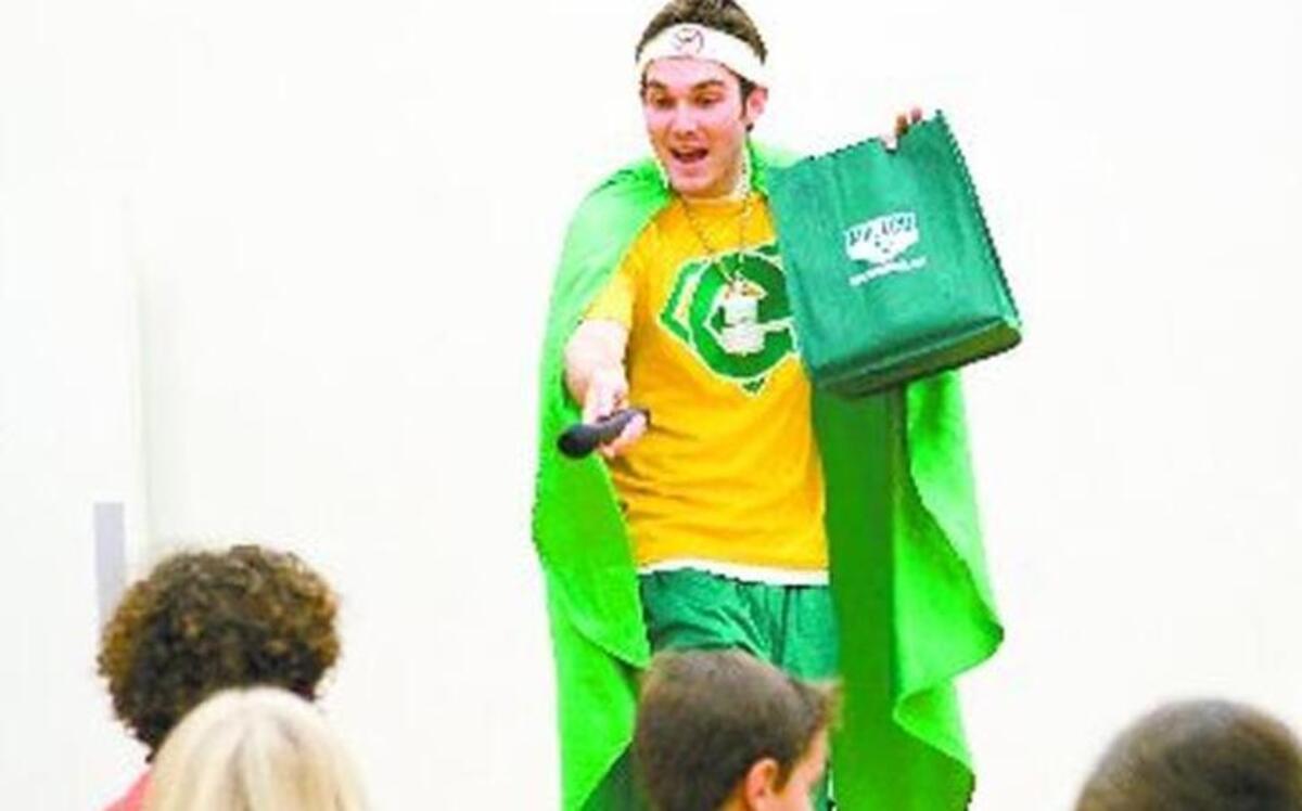 Cal Poly graduate Brett Edwards, also known as Mr. Eco, performs for kids at the YMCA in San Luis Obispo in 2012. He has a new environmental rap album for kids, “Renewable Rap.”