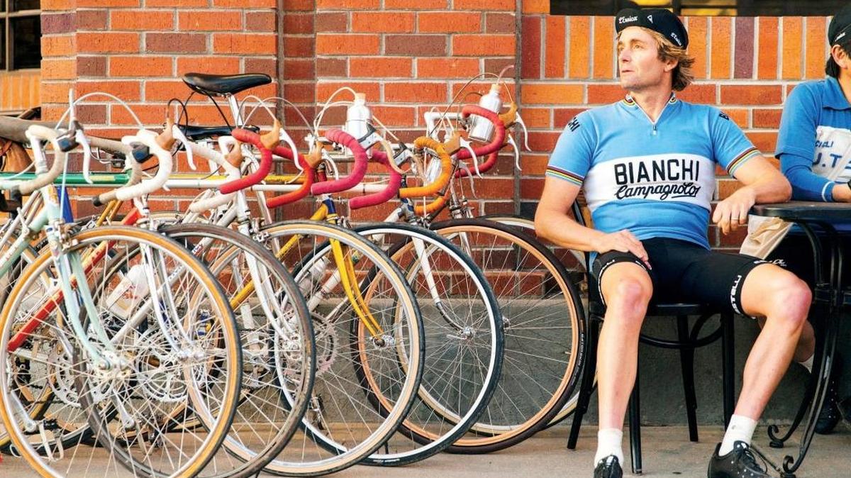 A rider of vintage bicycles relaxes outside Linn’s in Cambria.