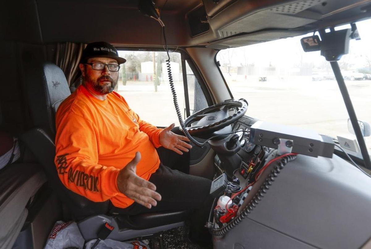At the San Paso Truck Stop near San Miguel, driver Joe Orcutt waits for word from dispatch on where to deliver a load of glass bottles that was scheduled for the Santa Barbara area. Truck traffic on Highway 101 must divert to Highway 5 to get around the mudslide closure in Montecito.