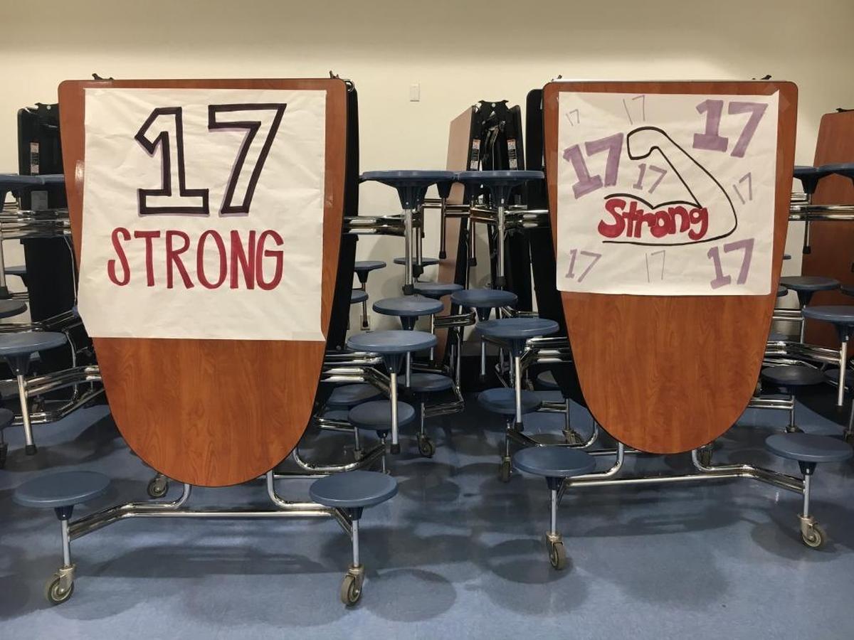 Signs celebrate Pismo Beach nonprofit 17Strong at Arroyo Grande High School.